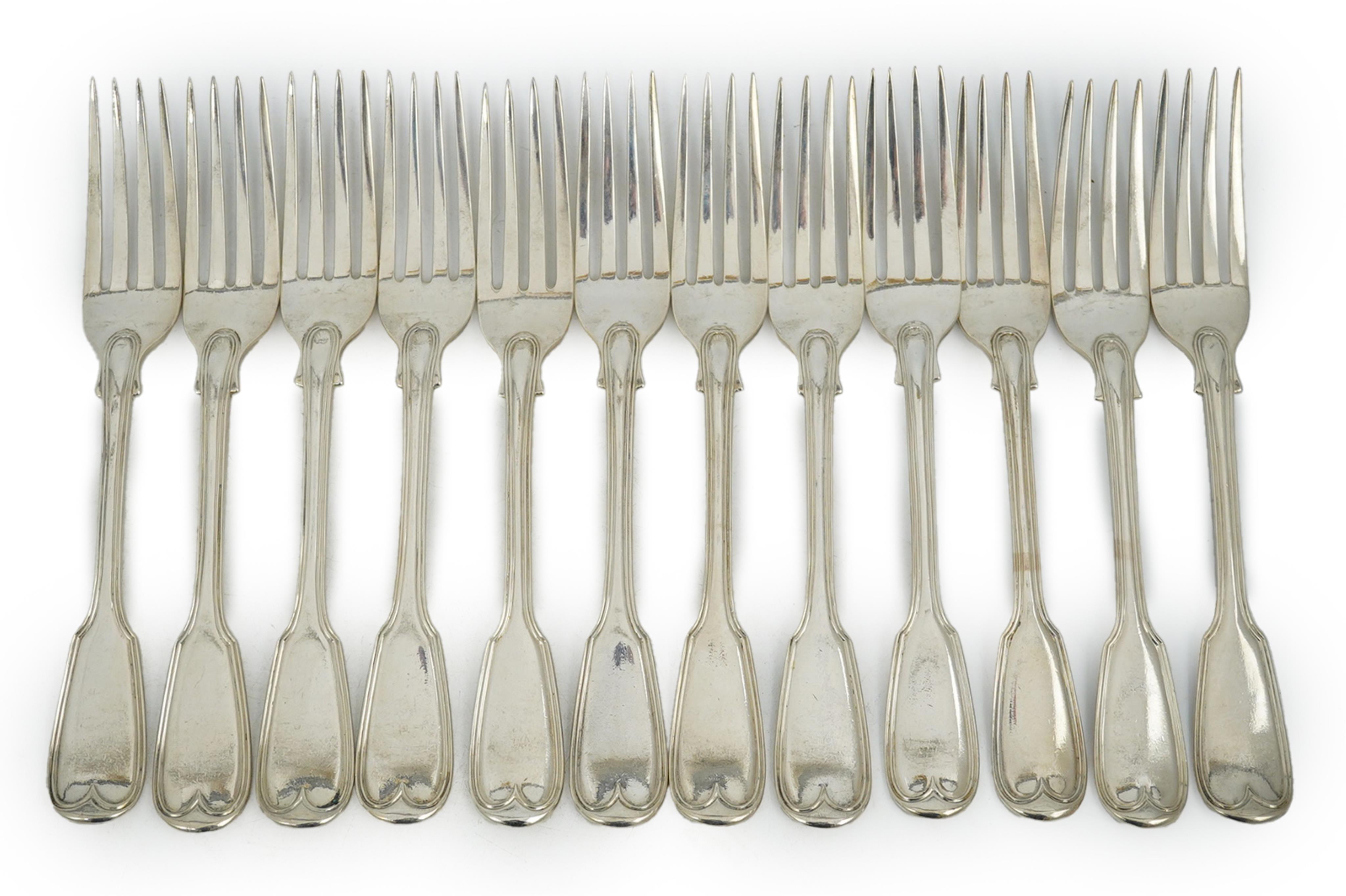 A set of twelve William IV silver double struck fiddle and thread pattern table forks, William Chawner II, London, 1831, 34.2oz.